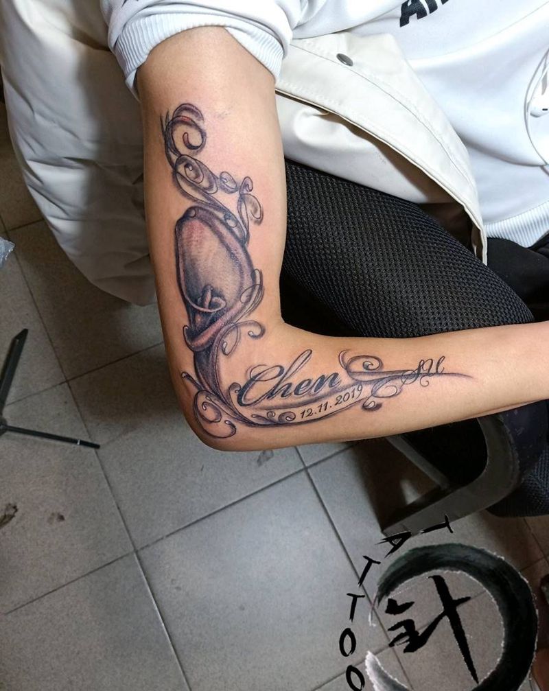 ～纹身图片_手臂花体字纹身图案