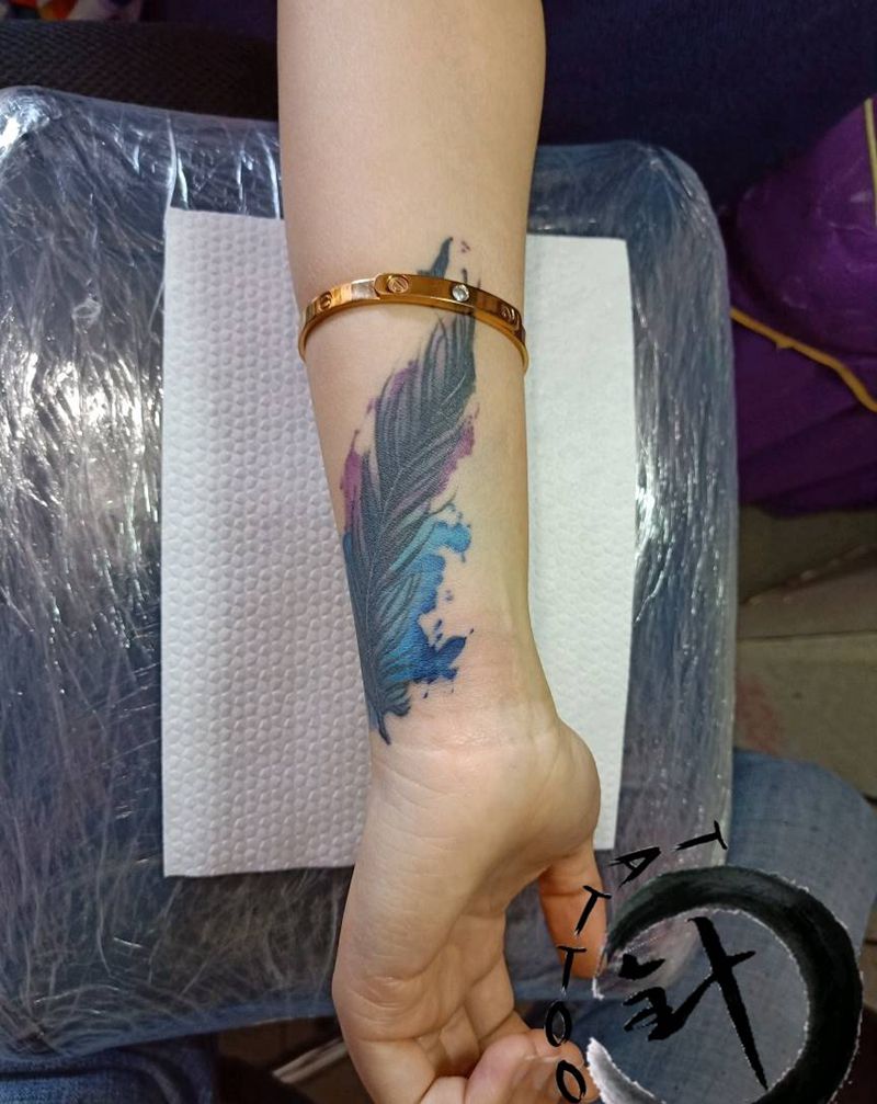 遮盖字母 羽毛恢复一年半纹身图片_手臂水墨水彩纹身图案