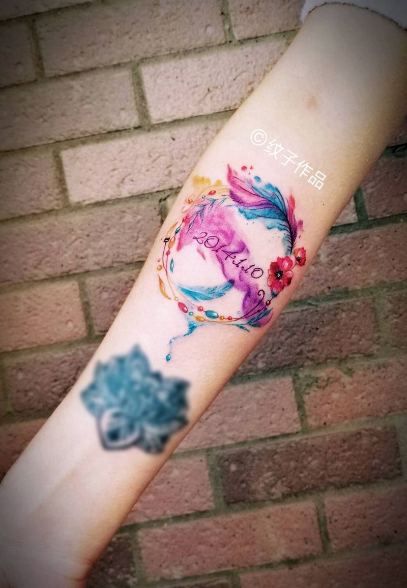 水彩羽毛纹身图片