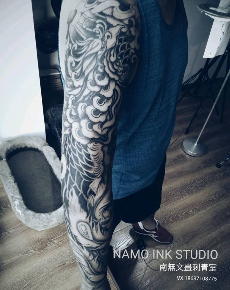 凤凰花臂纹身图片_手臂传统动物凤凰花臂成品纹身图案