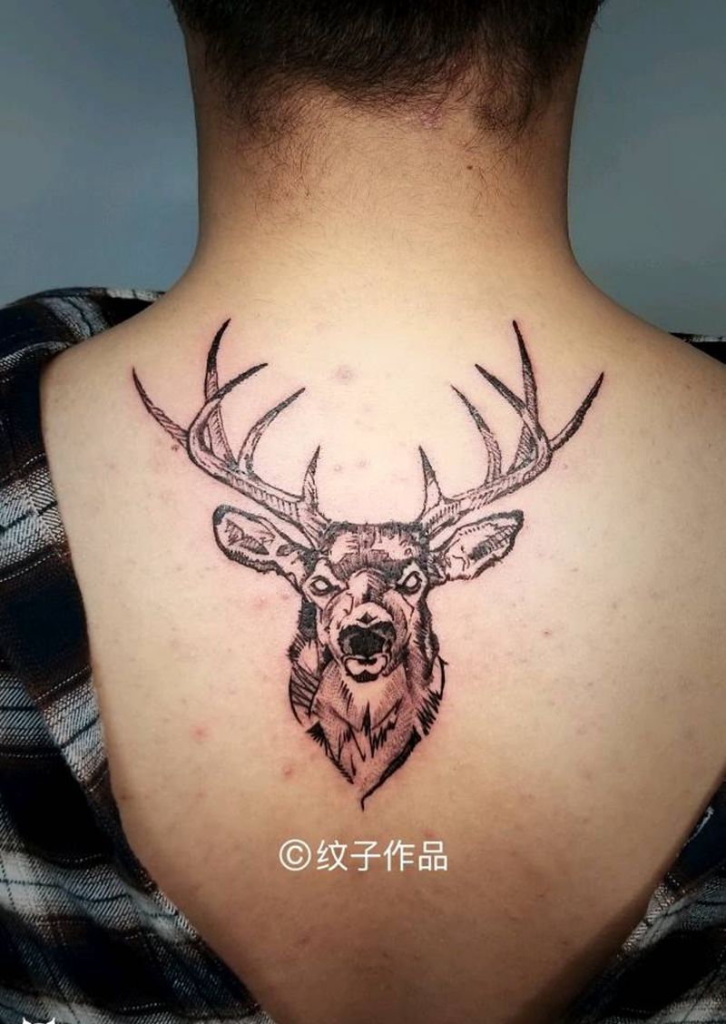 鹿头纹身图片_颈部纹身图案
