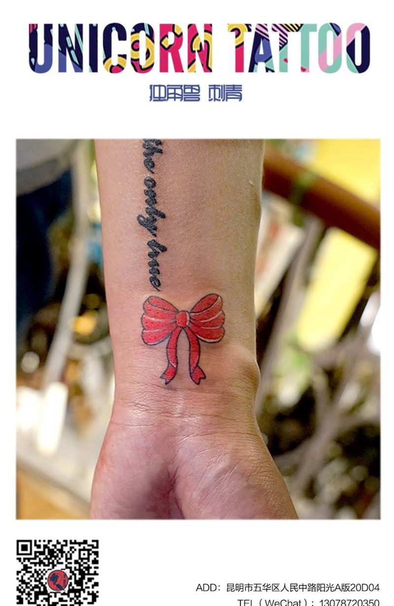 蝴蝶结纹身图片_成品手部清新纹身图案
