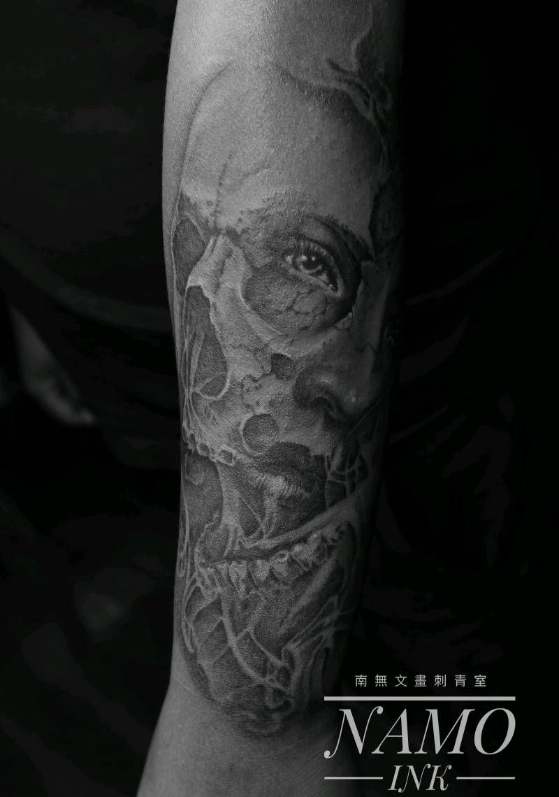 小臂骷髅脸纹身图片_手臂纹身图案