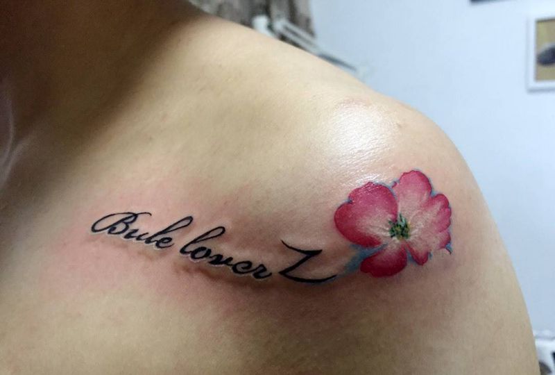 字和花纹身图片