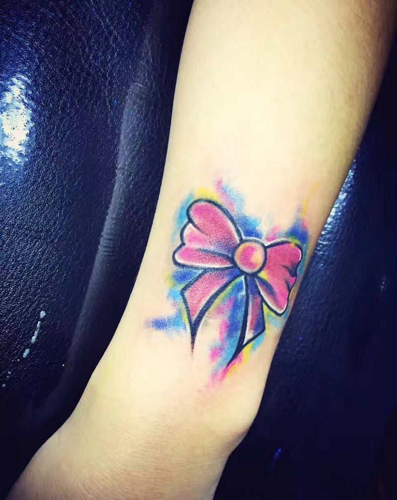 蝴蝶结纹身图片_手臂清新纹身图案