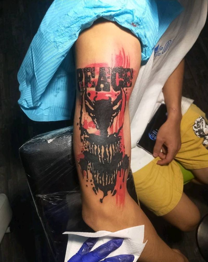 和平纹身图片_手臂花体字英文骷髅纹身图案