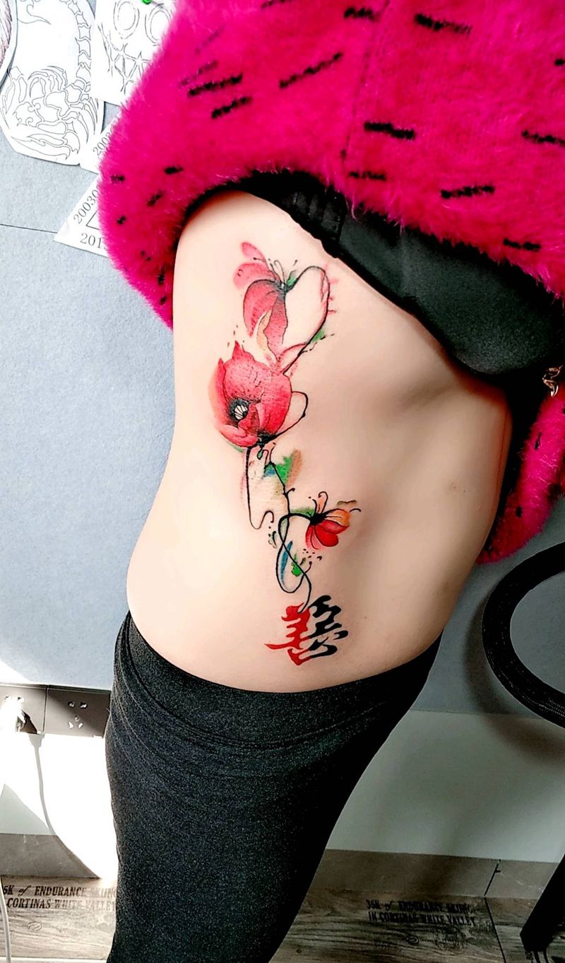 水彩 罂粟花纹身图片_腹部水彩纹身图案