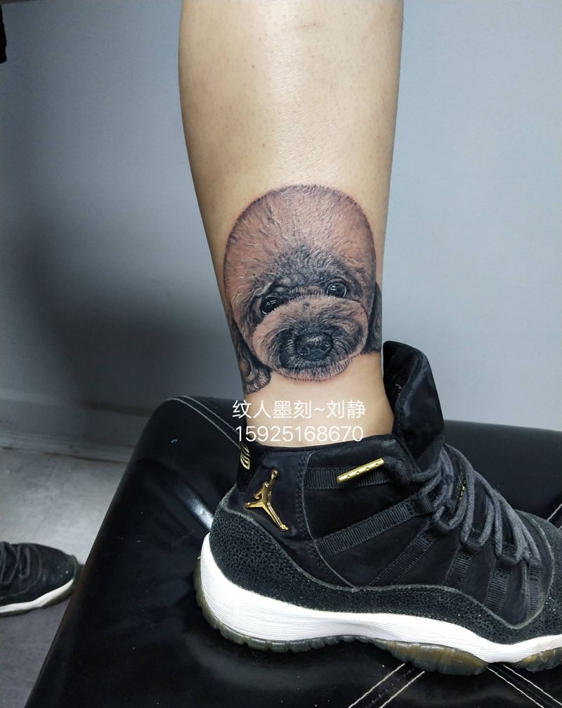 遗失的小狗狗纹身图片_脚部欧美写实写实纹身图案