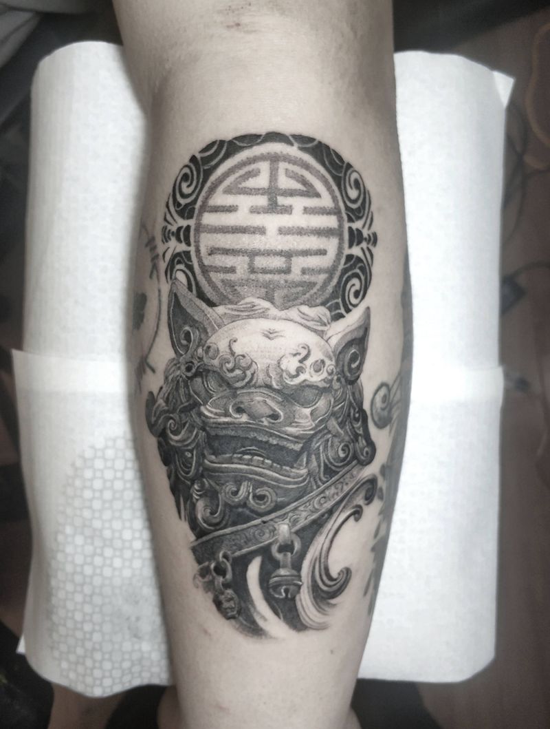 中国传统石狮子纹身图片_手臂写实纹身图案