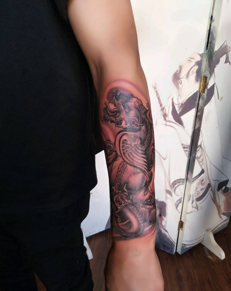 麒麟纹身图片_手臂传统鬼神昆明云南纹人墨刻修改遮盖成品纹身图案