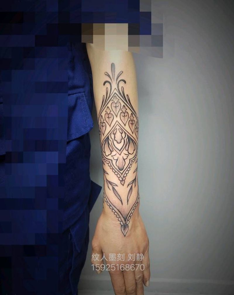 花儿纹身图片_手臂图腾点刺纹身图案
