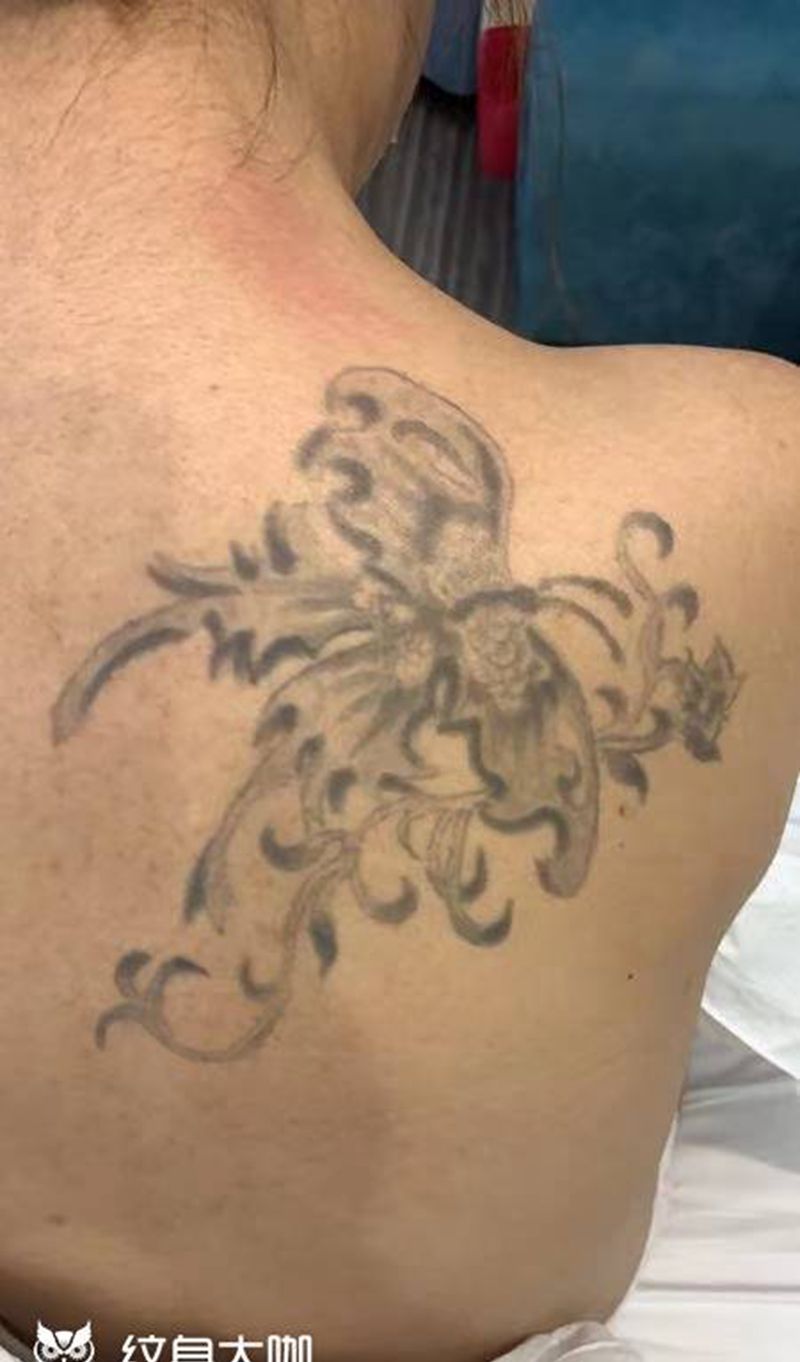 金鱼遮盖纹身图片_水墨纹身图案