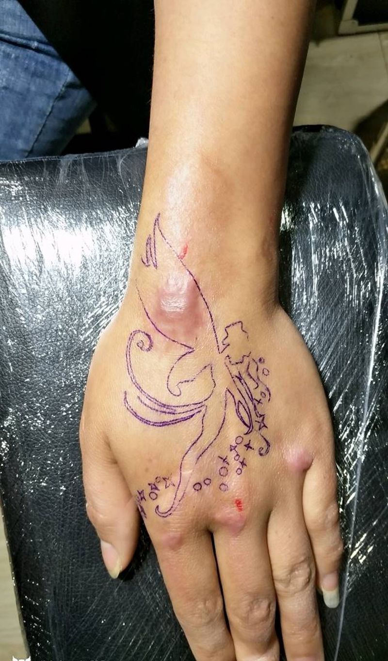 天使 遮盖伤疤纹身图片_手部新传统图腾纹身图案