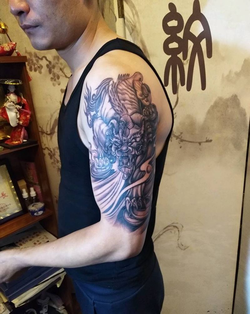 麒麟纹身图片_手臂传统动物昆明云南纹人墨刻成品纹身图案