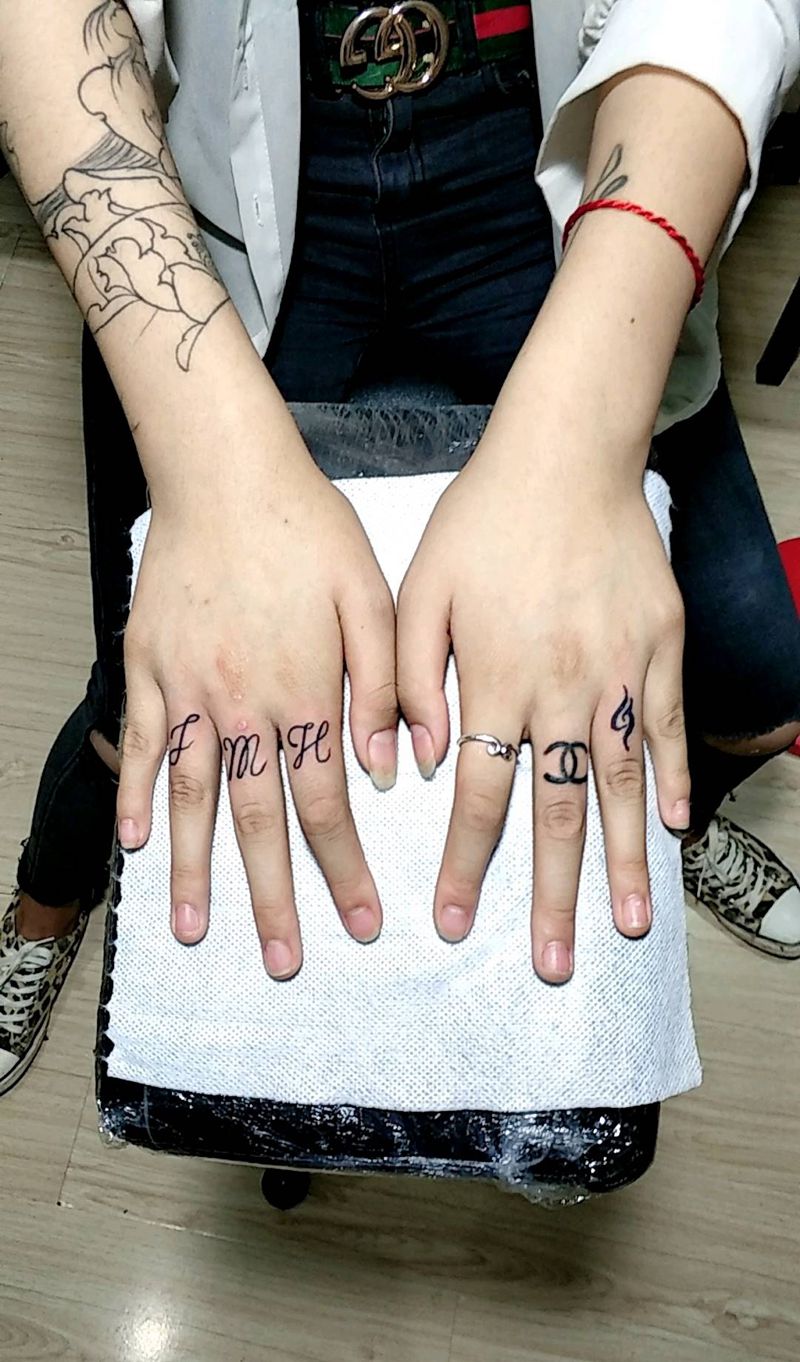 小图纹身图片_手臂图腾点刺纹身图案