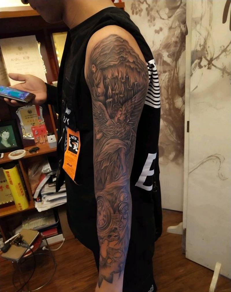 欧美花臂，完工了纹身图片_背部欧美写实花臂纹身图案