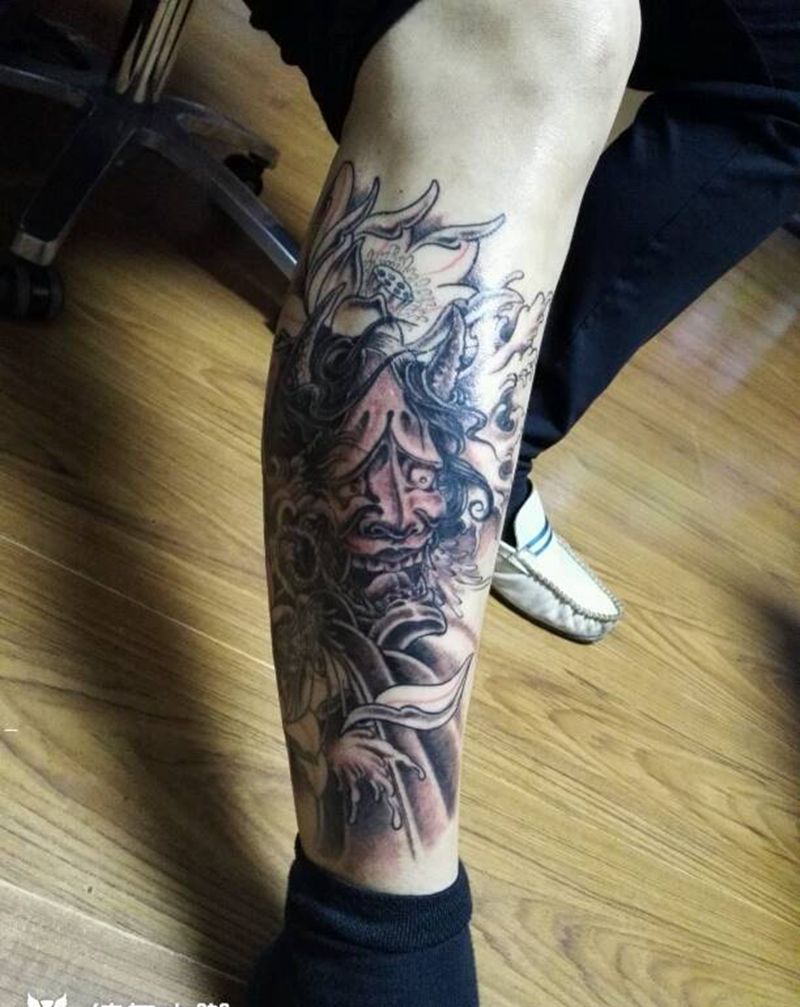 般若花纹身图片_腿部传统鬼神成品纹身图案