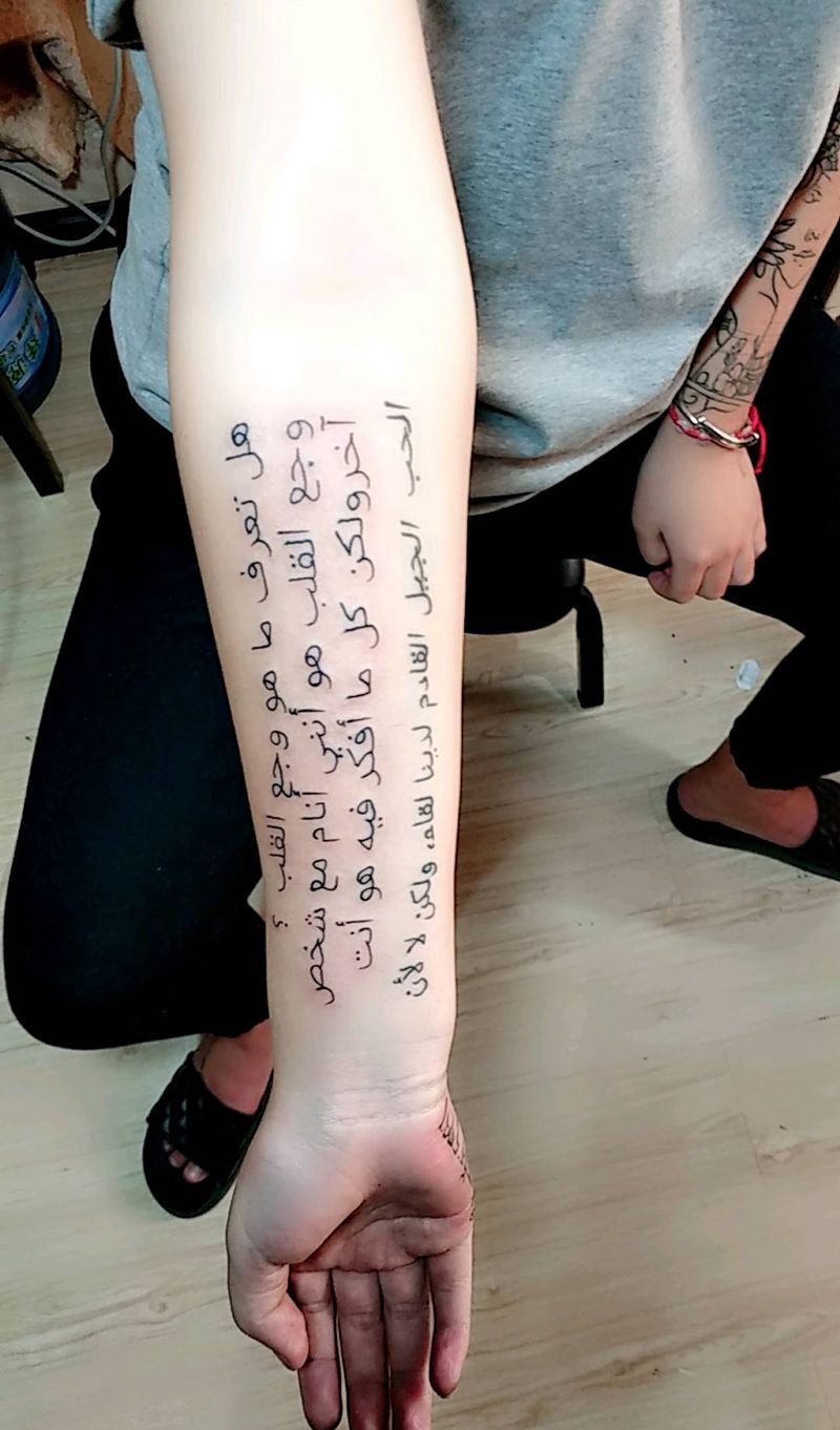 藏文纹身图片_手臂新传统点刺纹身图案