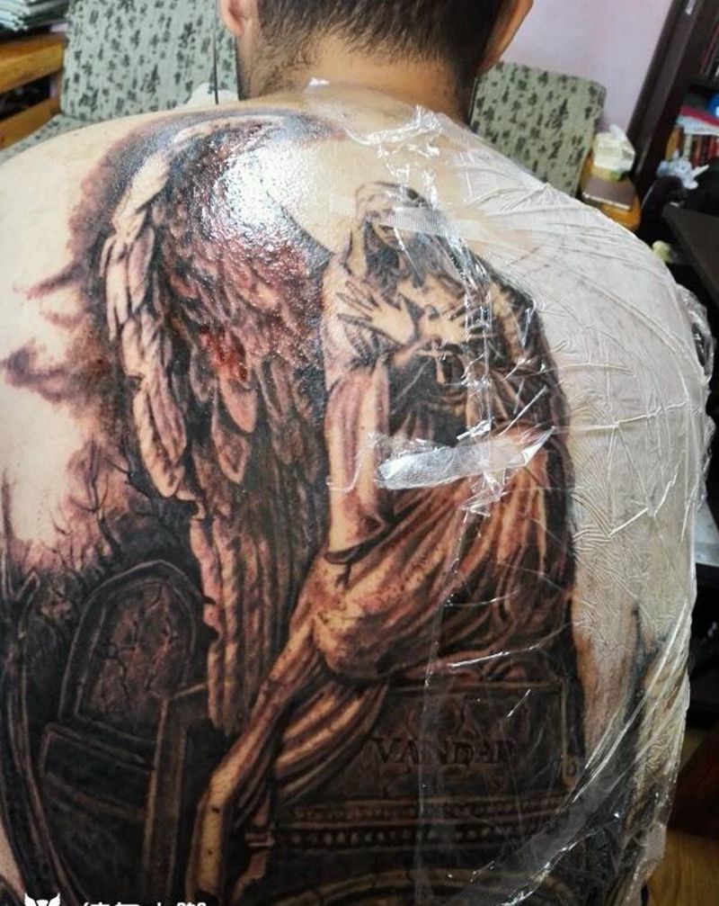 坟墓天使纹身图片_背部欧美宗教原创成品纹身图案