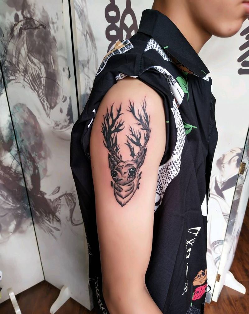 鹿纹身图片_手臂传统动物昆明云南纹人墨刻成品纹身图案