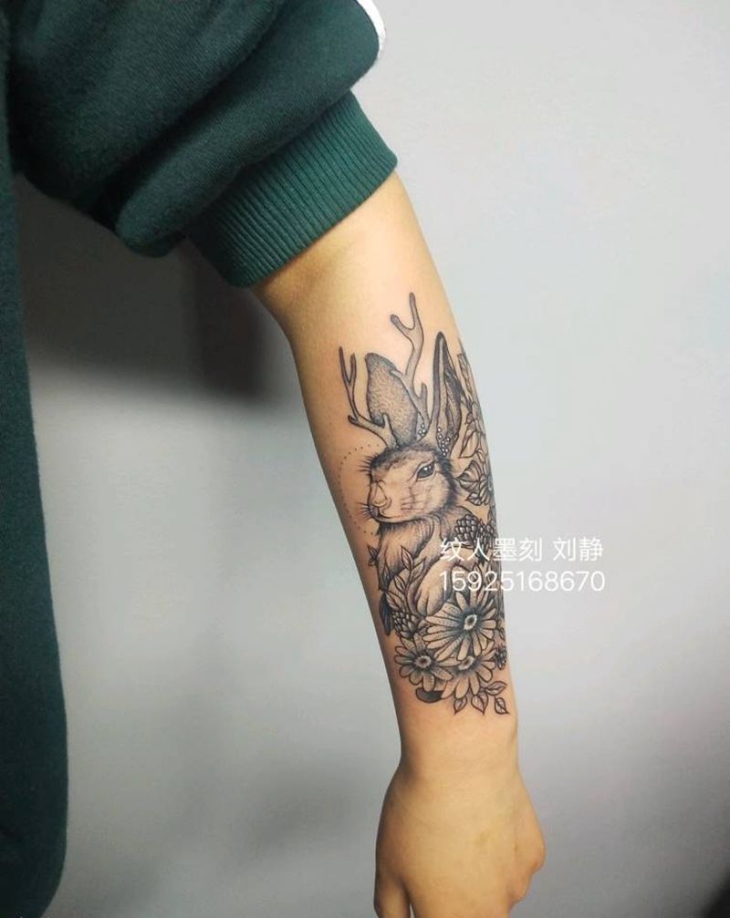 小兔纹身图片_手臂新传统点刺纹身图案