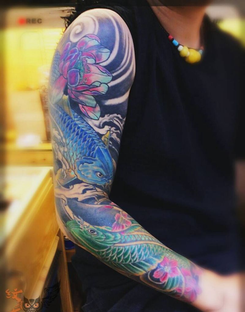 双鱼花臂遮盖旧图纹身图片_手臂传统动物原创纹身图案