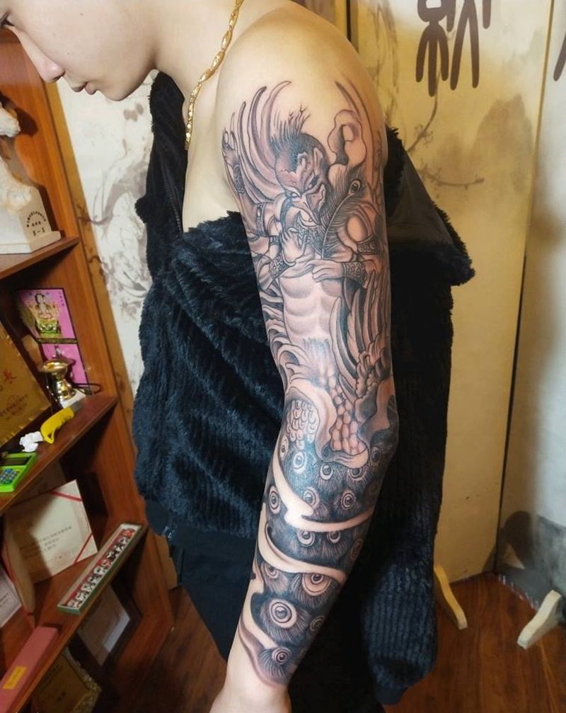 花臂未完纹身图片_手臂新传统纹身图案