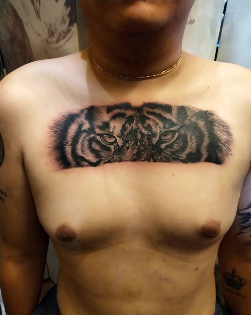 老虎眼睛纹身图片_胸部欧美写实写实老虎眼睛纹身图案