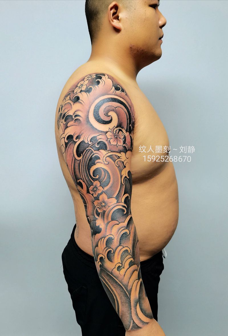 浪臂纹身图片_手臂新传统纹身图案