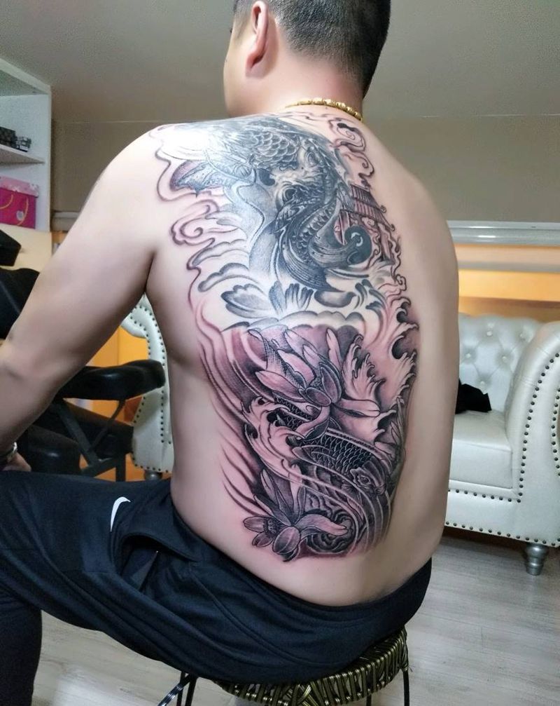 鱼跃龙门纹身图片_背部传统鬼神昆明云南纹人墨刻修改遮盖成品纹身图案