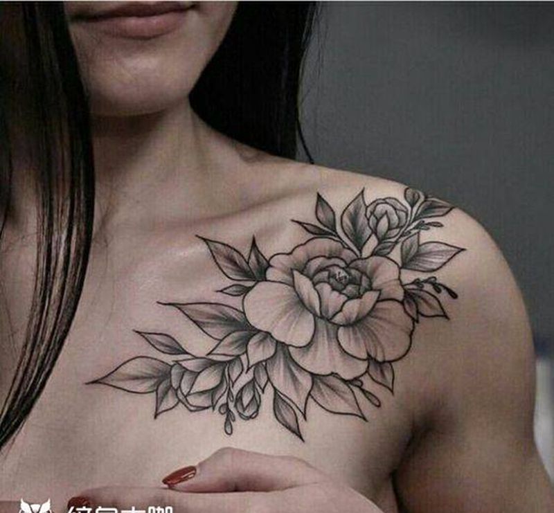 素花纹身图片_胸部纹身图案