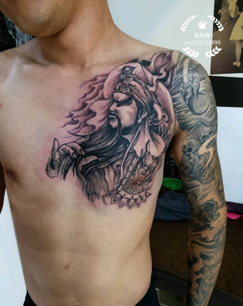胸口关公接图纹身图片_胸部纹身图案