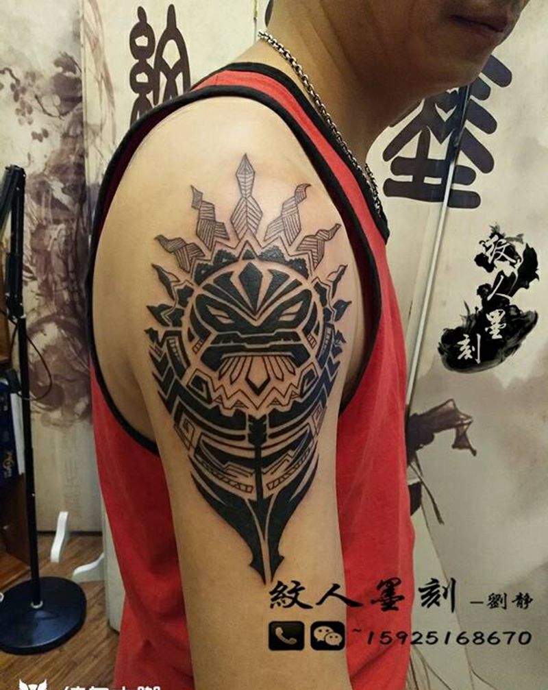 图腾纹身图片_手臂图腾昆明云南纹人墨刻成品纹身图案