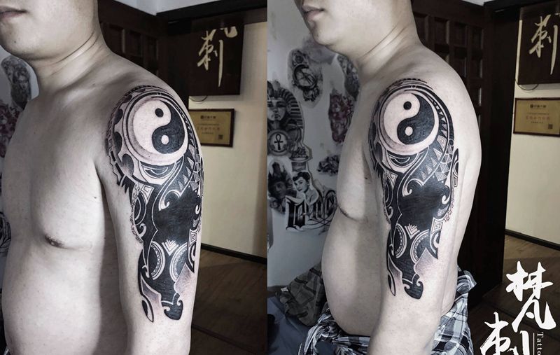 学员做的图腾这盖纹身图片_手臂纹身图案