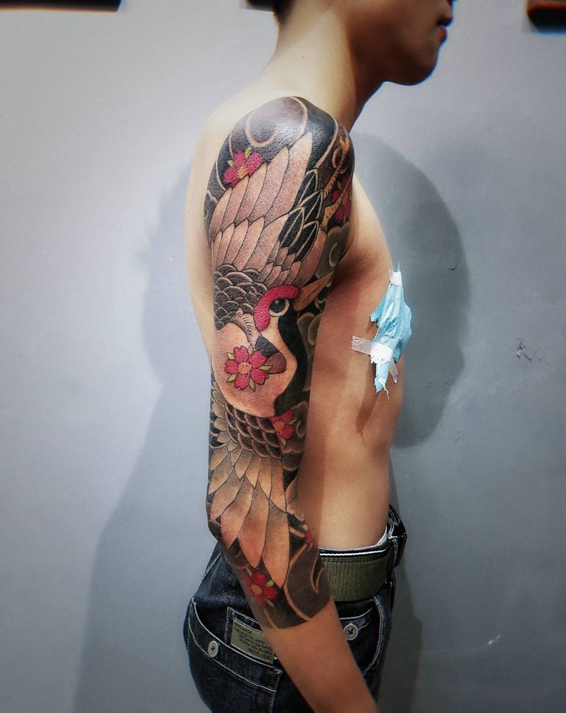 七分袖花臂仙鹤纹身图片_手臂老传统纹身图案