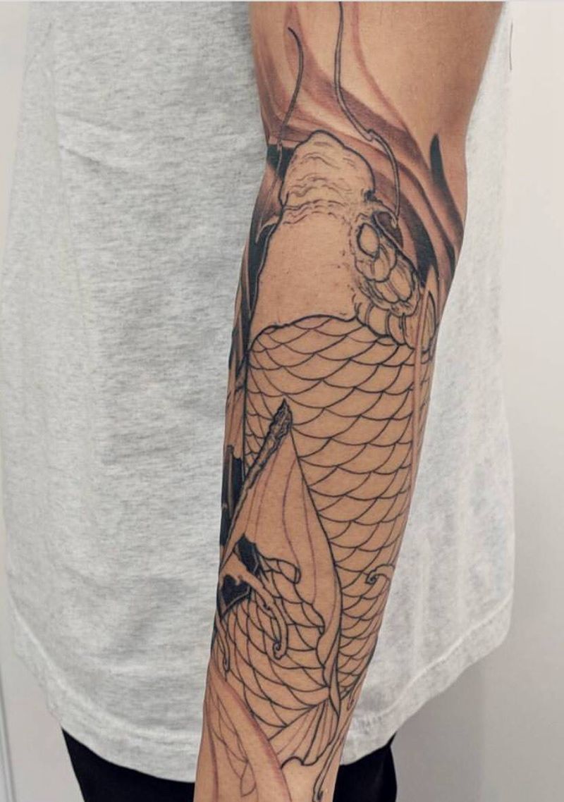 小臂鱼纹身图片