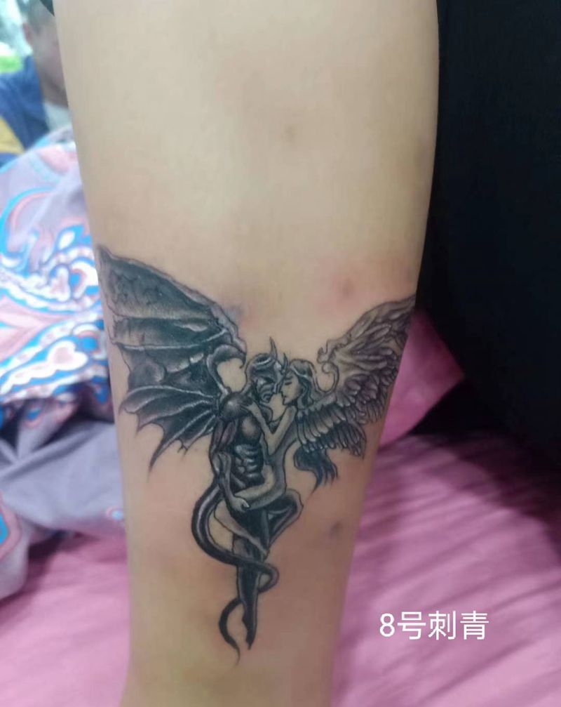 恶魔与天使纹身图片_腿部纹身图案