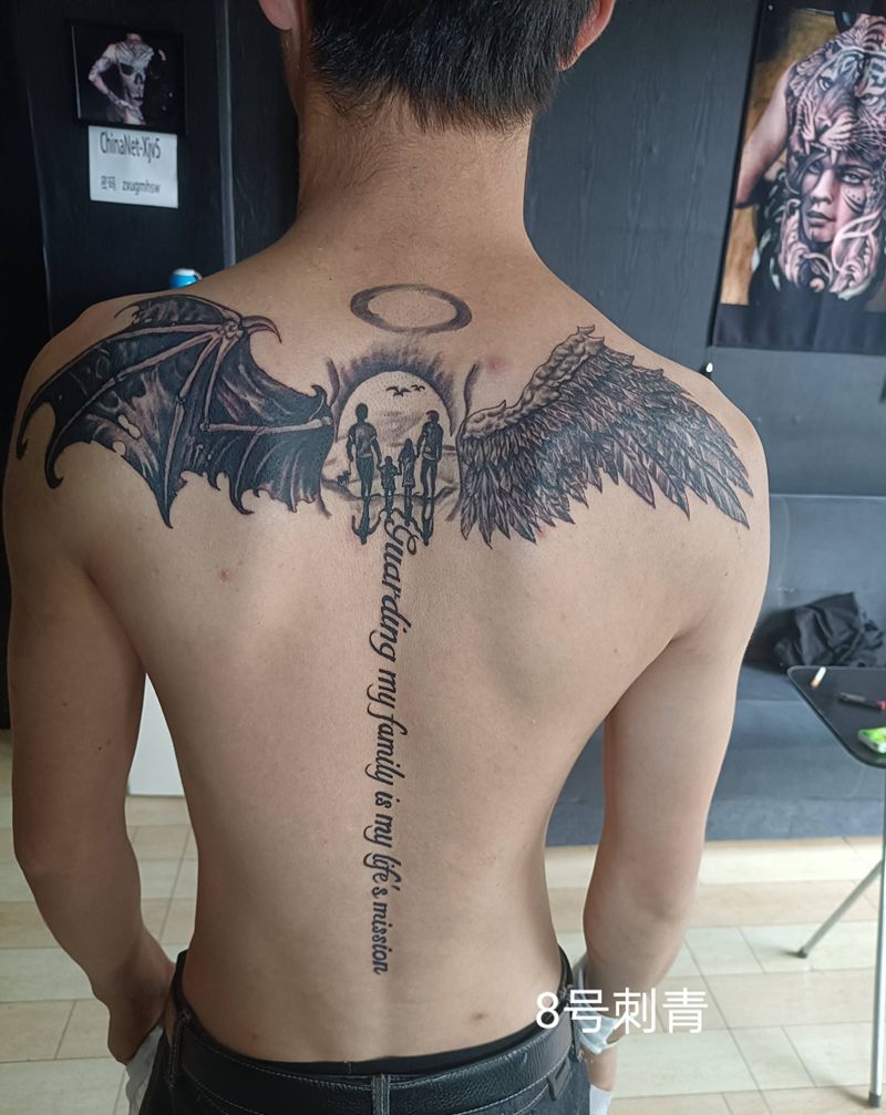 翅膀，寓意，守护家庭是一生的使纹身图片_背部纹身图案
