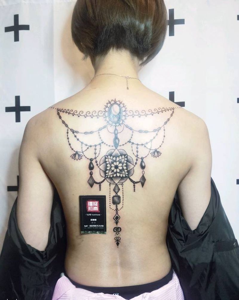 没想好作品名称纹身图片_肩部背部几何植物点刺成品纹身图案