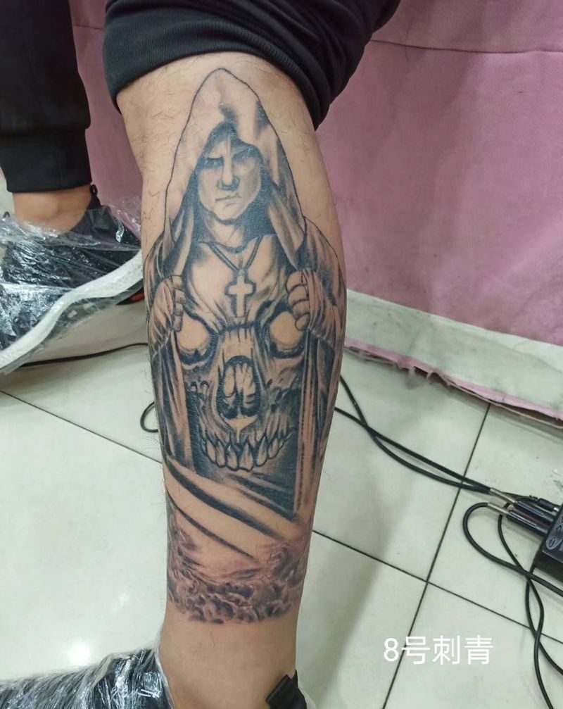 拳手纹身图片_腿部纹身图案