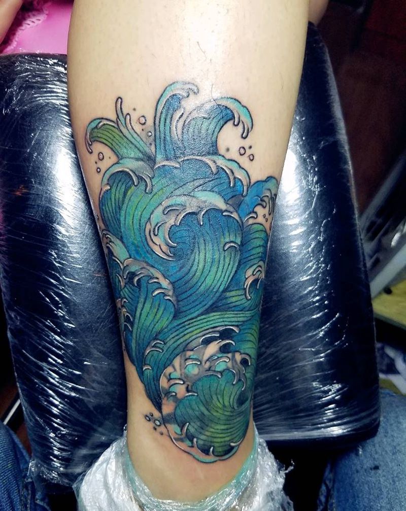 海浪遮盖图腾纹身图片