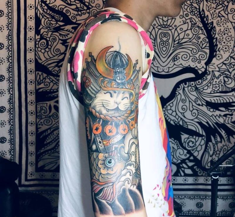武士猫纹身图片_手臂老传统动物纹身图案