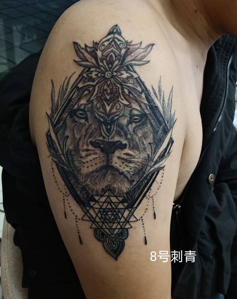 刮痧狮子纹身图片_手臂纹身图案