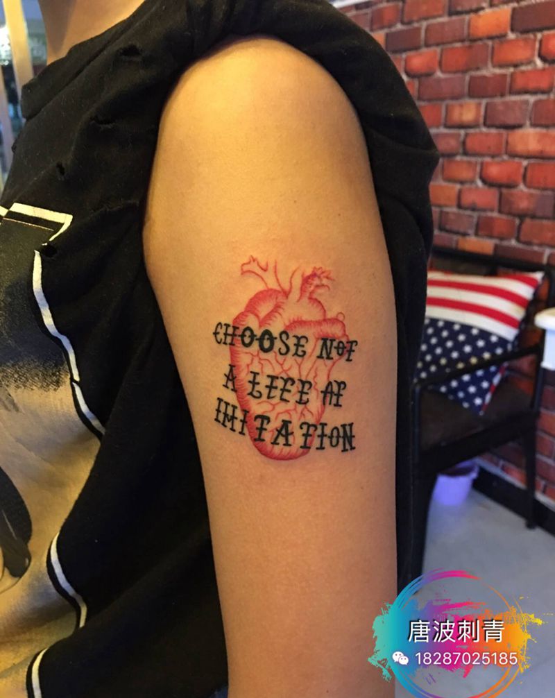 心脏纹身图片_手臂点刺水彩纹身图案