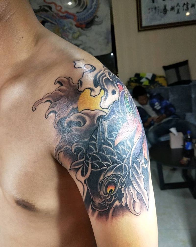 大臂鱼带遮盖纹身图片