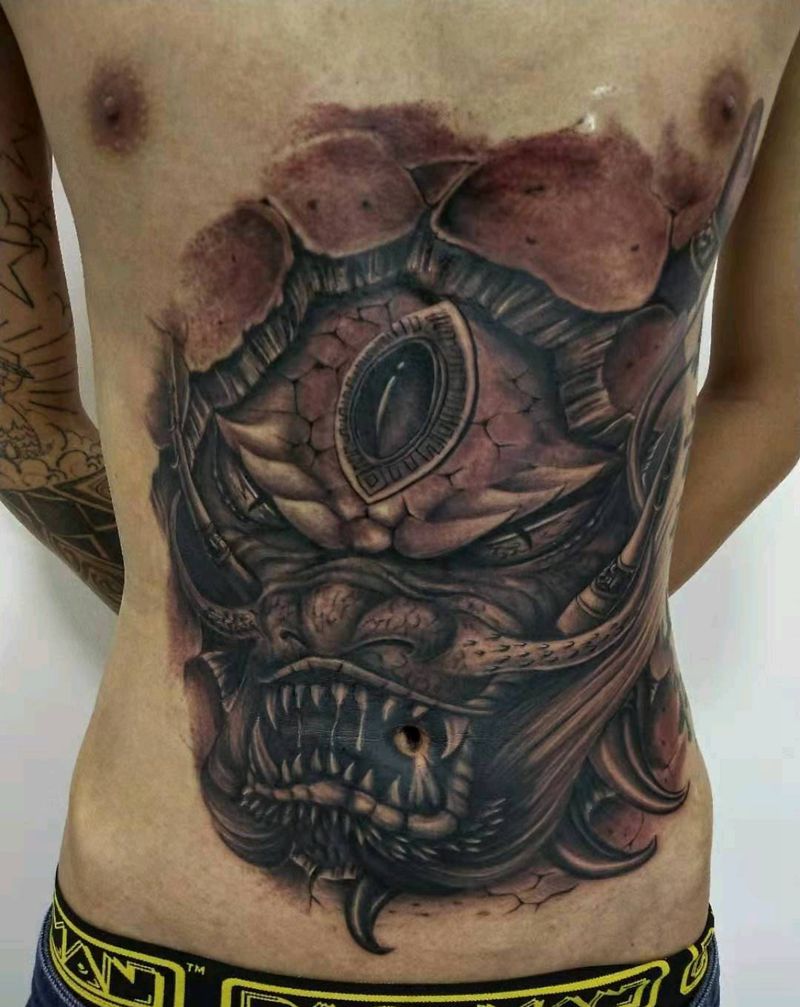 石裂龙纹身图片_腹部纹身图案