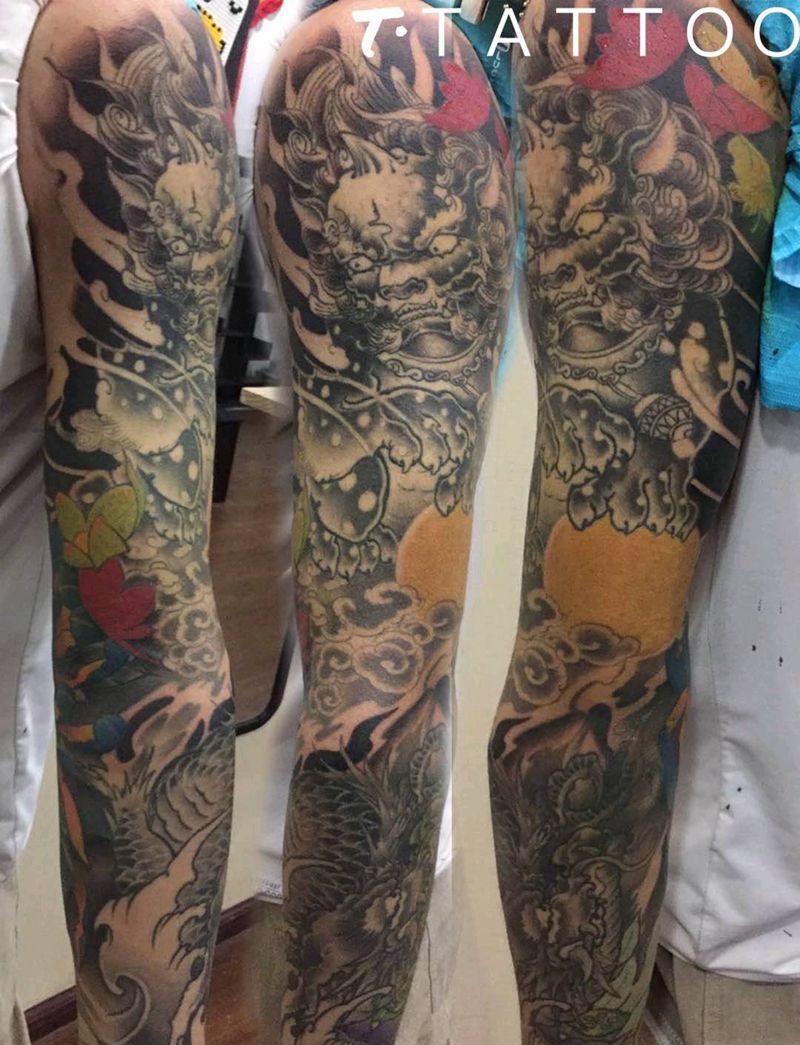 唐狮龙花臂纹身图片_手臂新传统纹身图案