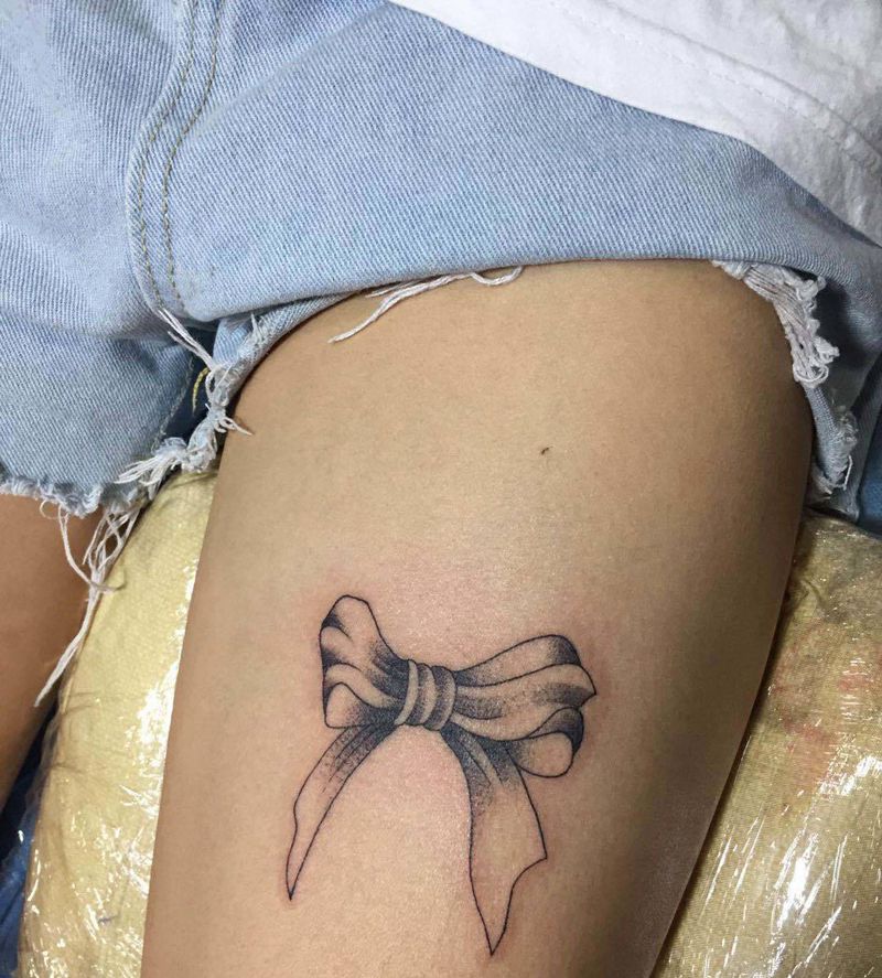 蝴蝶结纹身图片_腿部纹身图案