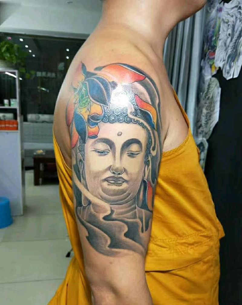 大臂开眼佛纹身图片