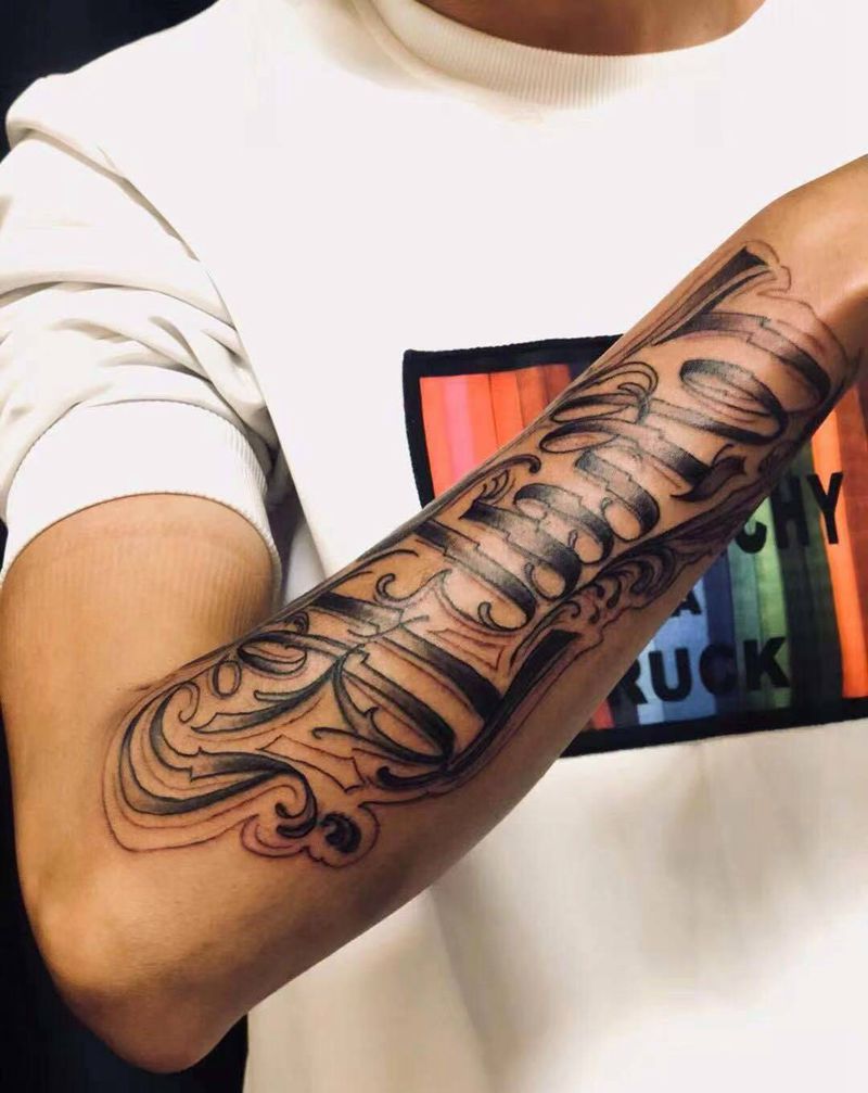 奇卡诺花体字纹身图片_手臂花体字纹身图案